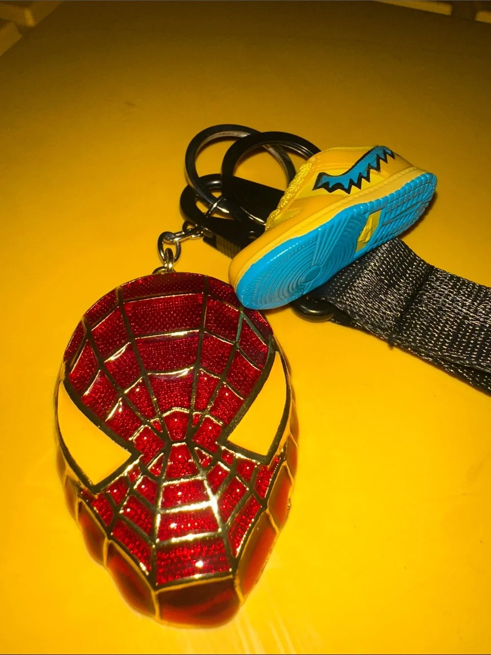 Jordan Kids Black Lanyard with Yellow jordSneaker Charm and Red Spider man Badge